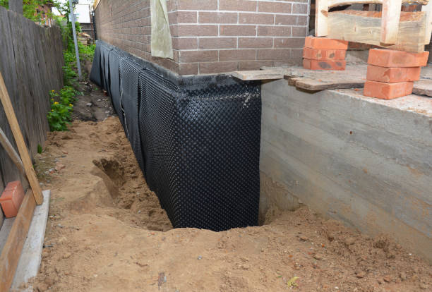 Happy homeowners after waterproofing job in Putnamville